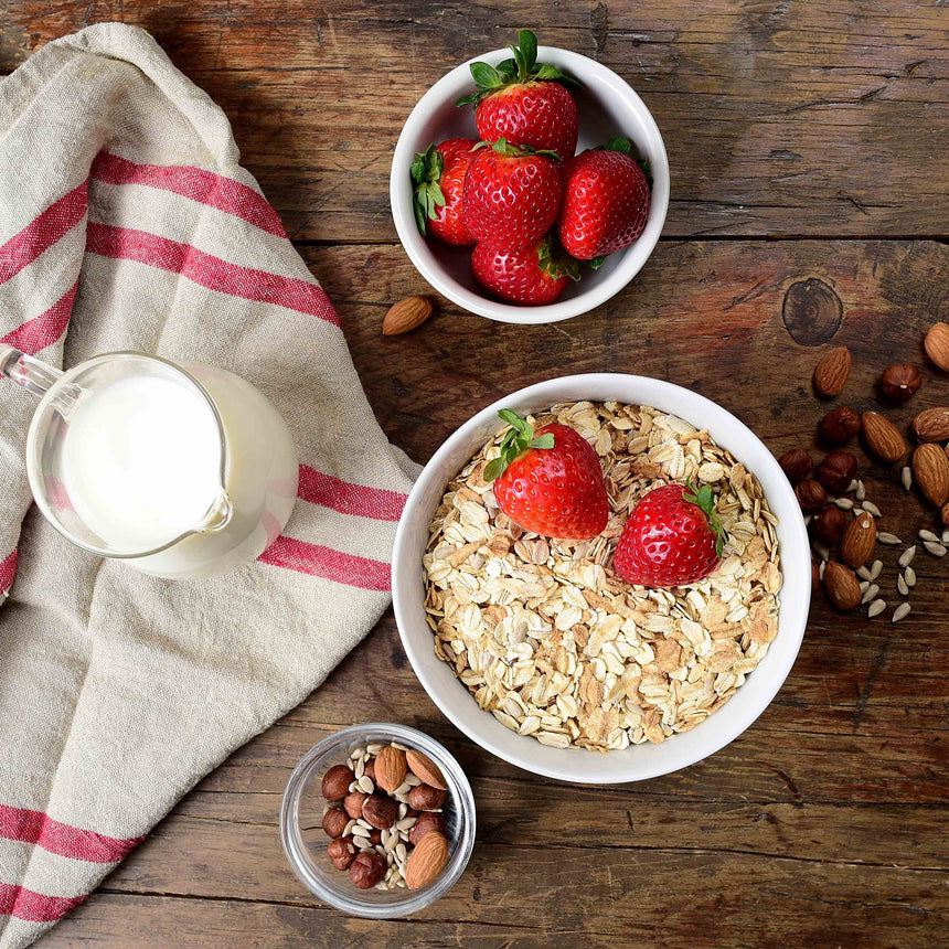 Cereal bowl filled with oats and strawberries